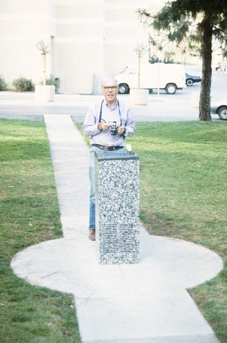 Untitled: Michael Asher with drinking fountain, looking northeast