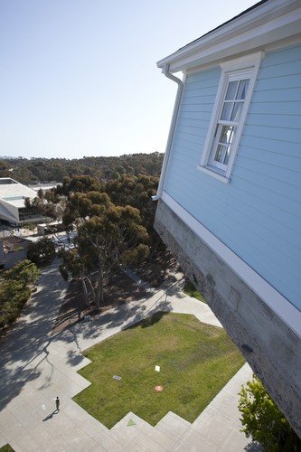 Fallen Star: wide-angle view of house cantilevered out, seven stories off the ground, plaza below and eucalyptus groves in the distance