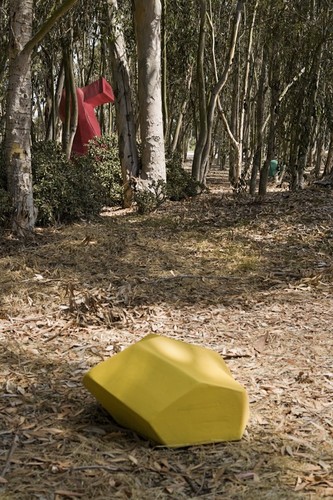 Red Shoe: partial view of shoe and gems in eucalyptus grove