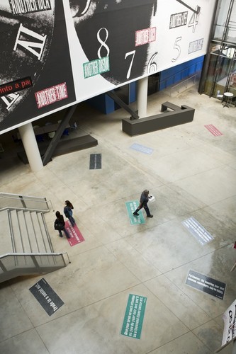Another: aerial view with partial view of "clocks" and terrazzo floor tiles with quotes