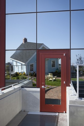 Fallen Star: reflected view of house and garden in mirrored glass of Jacobs School of Engineering