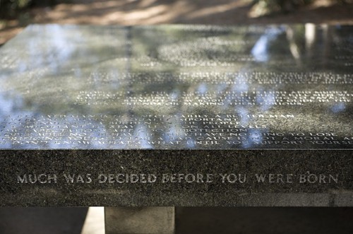 Green Table: detail view of text on tabletop and along the side