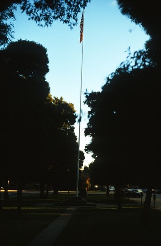 Untitled (proposed site): base of flagpole and view down the middle of the grassy median looking south