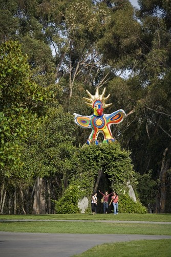 Sun God: general view of sculpture and vine-covered arch