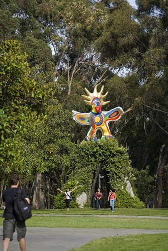 Sun God: general view of sculpture and vine-covered arch