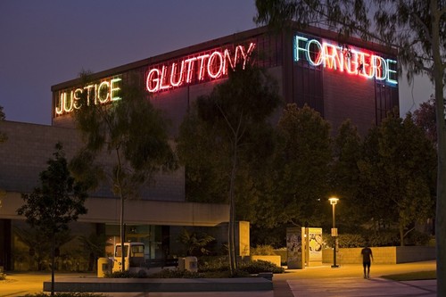Vices and Virtues: evening view showing "JUSTICE" "GLUTTONY" "FORTITUDE" "ANGER"