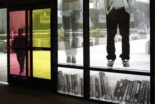 READ/WRITE/THINK/DREAM: detail of entrance from foyer showing images of books and student portraits