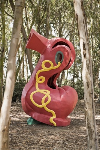 Red Shoe: shoe flanked by eucalyptus trees