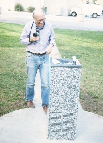 Untitled: Michael Asher with drinking fountain, looking northeast