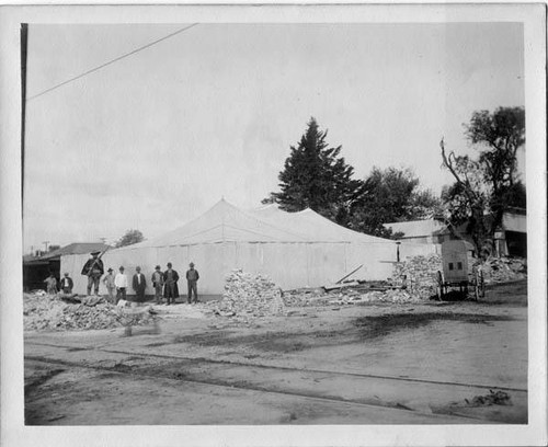 Work crew and a large tent