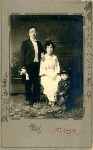 Studio portrait of Chinese family