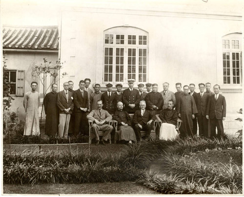 Group portrait of men in maritime uniforms