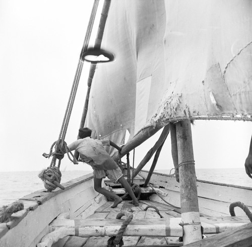 Dhowes (sailing freighters) Karachi, Pakistan. Outboards used to balance vessel when underway. Shot during FAO assignment