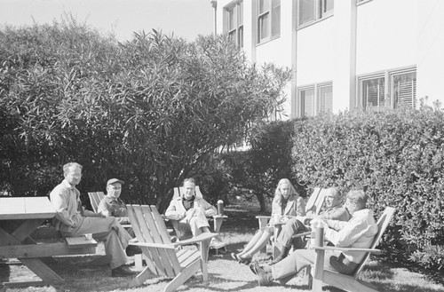 Lunches break for some staff workers, including Francis Parker Shepard (man on far right), at Scripps Institution of Oceanography, shown here near the original Scripps building. Circa 1948