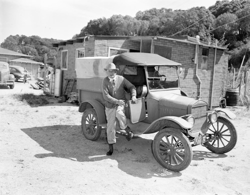 Frank della Rosa, former maitre d'hotel, Roberts at the Beach, San Francisco, retired in a shack and a 1920's Ford Pickup on the Beach in Inverness, California, 1950's