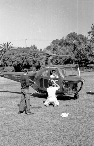 Actor Errol Flynn shown here arriving by helicopter at Scripps Institution of Oceanography. 1948