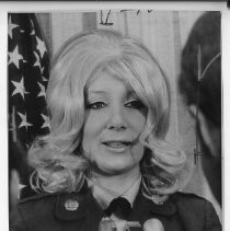 Ruth Holmes, after being sworn in--likely as the first woman member of the California National Guard