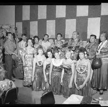 Hawiian band, dancers and guests at a banquet