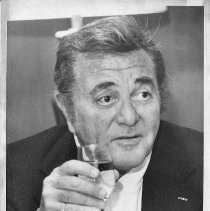 Tony Martin, the singer and actor. Portrait, holding up stemmed glass