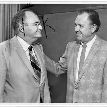 Bernard Hyink, President of Sacramento State University (CSUS) from 1970 to 1972, right, congratulates Dr. Harold B. Roberts, a teacher and administrator who retired this spring