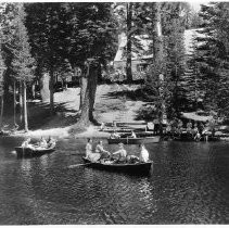 View of boaters on the lake at Camp Sacramento