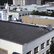 Demolition site at K and L, 12th and 13th Streets for the new Hyatt Hotel in 1984. A State of California building and a public parking lot occupied the site