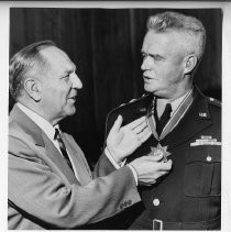 Goodwin Knight, Governor of California from 1953-1959. Here, he awards California Medal of Valor to Major General William F. Dean