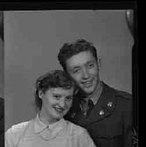 A soldier and a young woman