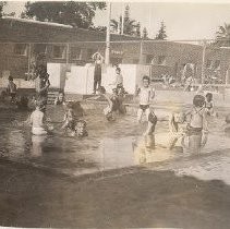 Children Splashing in Pool