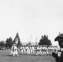 Soldiers march at a fair