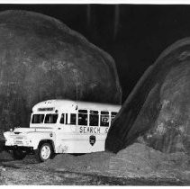 Rescue Bus Squeezes Between Two Boulders