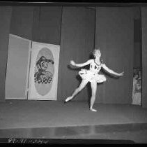 A ballerina dancing on a stage