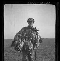 A hunter with ducks