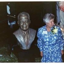 Photographs from Aubrey Neasham Bust Dedication at the Sacramento History Museum in Old Sacramento. Irene Neasham unveiling bust