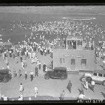 A crowd of people at an airport