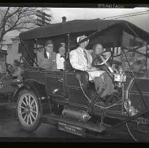 Shriners in a horseless carriage