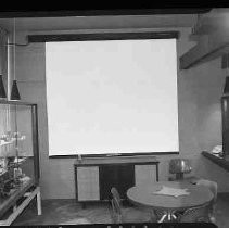 McCurry's store, showing a Dalite Electric Screen, such as those commonly used to show films or slides