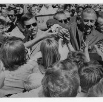 Presidential candidate Eugene McCarthy shakes hands with supporters