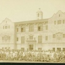 Class of School Students in front of their School