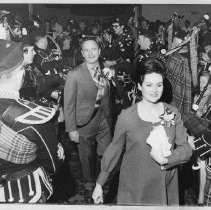 Sacramento City Councilman, James G. Fuller, center chosen Irishman of the Year is surrounded by bagpipers