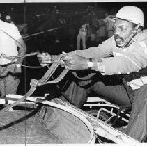 Willie Brown driving a sulkie at Golden Bear Raceway