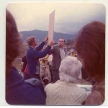 Photographs of landscape of Bolinas Bay. Group gathered for a ceremony