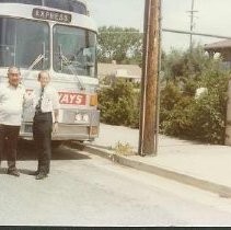 Tule Lake Linkville Cemetary Project: Two JACLers Pose In Front of Tour Bus