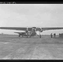 Two airplanes on a runway