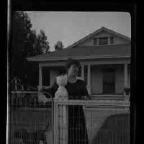 A woman standing in a yard