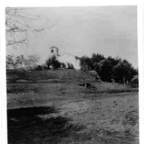 Photograph of field with San Juan Bautista in background