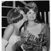 ROYALTY Shari Kling is the Miss Metropolitan Sacramento for 1966. She receives a congratulatory kiss from the 1965 titleholder, Cappie Gshwandtner