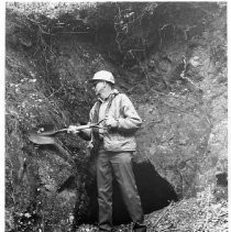 A man with a shovel digs near the site of the proposed Auburn Dam