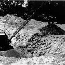 "Dragline Digging a Retention Pond"