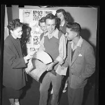 Newspaper Clinic, Students inspecting stereo